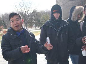 Han Yi of E1 Transit talks with Lambton College students about his inter-city transit business based on Tesla electric vehicles. (NEIL BOWEN/Sarnia Observer)