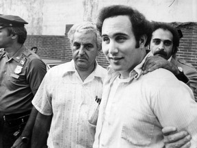 David Berkowitz is taken to a police precinct in 1977 after being arrested in connection with the "Son of Sam" murders. (Barton Silverman/New York Times Photo)