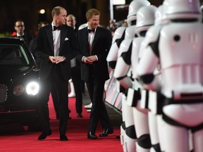 Prince William, Duke of Cambridge, left, and Prince Harry attend the European premiere of Star Wars: The Last Jedi, at the Royal Albert Hall, in central London, Tuesday, Dec. 12, 2017. (Eddie Mulholland/Pool Photo via AP)