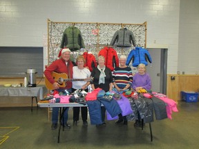 A folk musical group/gathering launched a fundraiser directed towards the Huron County Christmas Bureau in Seaforth.  Names as followed, from left to right: Tom Melady, June Zettel, Elaine Floyd, Lois Scoins and Honee Scott. (Submitted photo)