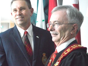 New warden David Marr, right, stands alongside outgoing warden Grant Jones at the County of Elgin meeting Tuesday night. Jones declined to run for a second term, keeping with tradition; of the last ten wardens, none have run for re-election. (Louis Pin/Times-Joural)