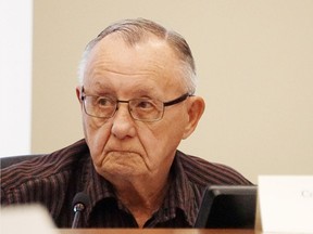 Luke Hendry/The Intelligencer
Centre Hastings Mayor Tom Deline, a Hastings County councillor, listens to a report during a meeting of the Hastings County community and human services committee Wednesday in Belleville. He called for action "in my lifetime" on ambulance deployments.