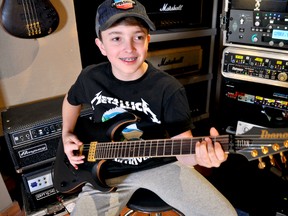 Aspiring musician Owen Davey was recently at Charterhouse Studios in London playing a few Metallica riffs on a brand new guitar. (CHRIS MONTANINI, Londoner)