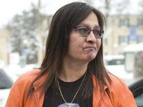 Nicole Ireland wears a shirt with the picture of her dad Carson Ireland who was murdered in Oneida on Dec. 21, 2014. Ireland and her family were in court for a sentencing hearing for Brennan Nicholas, 23, who pleaded guilty in June to the second-degree murder in the 2014 shooting death of Carson Ireland at a home on the Oneida Nation of the Thames. Ireland was in court giving a victim impact statement in London, Ont. (MIKE HENSEN, The London Free Press)