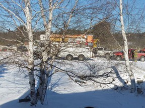 Emergency services respond to a helicopter crash near Tweed, Ont. on Thursday, Dec. 14, 2017. Photo supplied by Kim Clayton