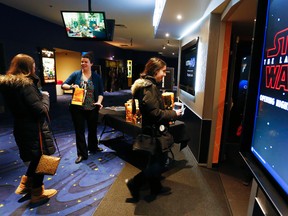 People get ready to watch the first screening of Star Wars: The Last Jedi movie on Thursday December 14, 2017 at Galaxy Cinemas Peterborough in Peterborough, Ont. CLIFFORD SKARSTEDT