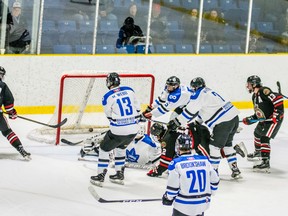 Matt Stoia (No. 24 in black) scores his second goal of the game Thursday against the London Nationals. The Nats won the Jr. 'B' hockey contest 6-5 in overtime. (Photo courtesy of Shawna Lavoie)