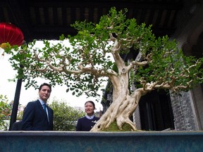 Prime Minister Justin Trudeau is given a tour of the Chen Clan Academy in Guangzhou, China on Thursday, Dec. 7, 2017. THE CANADIAN PRESS/Sean Kilpatrick