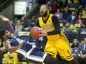 London Lightning's Royce White knocks down CJ Washington of the Halifax Hurricane on a drive to the basket during the Lightning's home opener on Sunday November 26, 2017 at Budweiser Gardens. (MIKE HENSEN, The London Free Press)