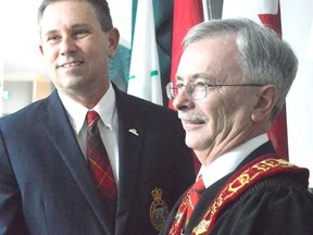 New warden David Marr (right) stands alongside outgoing warden Grant Jones at the Elgin County council meeting on Dec. 12. Jones declined to run for a second term, keeping with tradition. Of the last 10 wardens for Elgin County, none have sought to seek re-election.