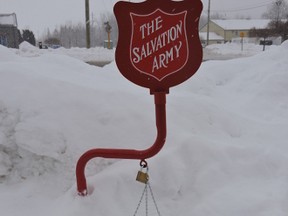 One of the Salvation Army’s Christmas Kettles buried in a snow bank. (Contributed photo)