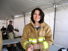 Liane Tessier, a former firefighter, says her 12-year battle against "systemic" gender discrimination has ended with a settlement that will see a public apology issued by the city of Halifax during a news conference on Monday. THE CANADIAN PRESS/HO-Courtesy of Liane Tessier