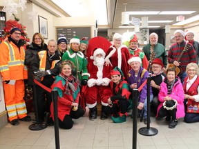 Santa Claus, Mrs. Claus and their elves were at the Cochrane Station with members of the Cochrane Lions Club and Ontario Northland employees.