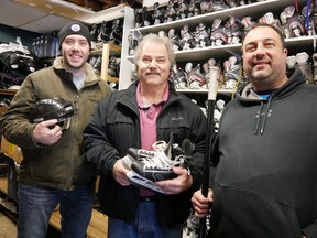 Dave Martin - Tillsonburg Kinsmen Club, Kim Alexander - Club Oxford Hockey president, and George Manias - All Seasons Sports Exchange in Tillsonburg. (Chris Abbott/Tillsonburg News)