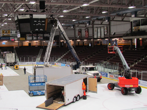 Crews moved parts and equipment onto the ice at Sarnia's Progressive Auto Sales Arena Monday to begin work on replacing the scoreboard over centre ice. The work, being carried out by the Sarnia Sting OHL hockey team, is expected to be completed in time for the team's Dec. 28 home game against Windsor. Paul Morden/Sarnia Observer/Postmedia Network