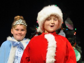 Colby Faust (right), as Santa, and Tequila Davidson (left), as a princess in charge, were just two of the primary students of Upper Thames Elementary School (UTES) to present the holiday musical Toys! The Night They Came Alive! on Thursday, Dec. 14. ANDY BADER/MITCHELL ADVOCATE