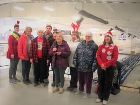 The local walking group meets weekly for a leisurely, low-impact workout. Last Wednesday, the strollers wore ugly sweaters and enjoyed homemade holiday treats to wrap up the program until the new year. (PHOTO BY SHEILA PRITCHARD/CLINTON NEWS RECORD)