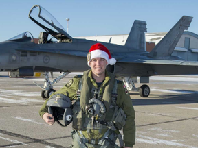 RCAF Capt. Kevin Mittelholtz of St. Thomas is one of four CF-18 fighter pilots chosen for special North American Aersospace Defence Command (Norad) duty on Christmas Eve: escorting Santa Claus?s sleigh safely through Canadian airspace. (Cpl. Justin Roy/4 Wing Imaging)