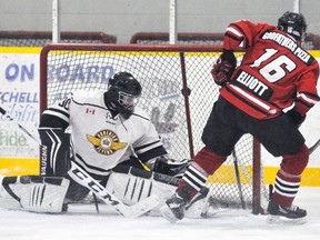 Derek Elliott (16) of the Mitchell Hawks scores his second goal of the game past Goderich Flyers goalie Brandon Bean Saturday, Dec. 16, a 9-4 Hawks’ win. ANDY BADER/MITCHELL ADVOCATE