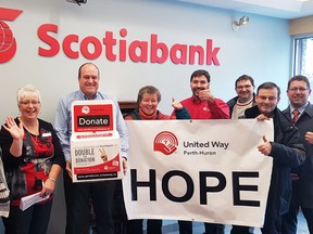 Santa Claus (left) was part of the entourage which included Mitchell’s Scotiabank branch on their trip through Huron-Perth last Thursday, Dec. 14. Others to the left of Santa included United Way Chair Andrew Williams, Kaela Sales, Marilyn Vandenbussche and Stuart Campbell of Scotiabank in Mitchell, Mimi Price of the YMCA, Executive Director Ryan Erb of the United Way, West Perth CAO Jeff Brick, Chad Alberico of the United Way and Perth-Wellington MP John Nater. SUBMITTED