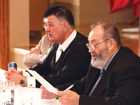 Ward 3 Coun. Gerry Montpellier, right, makes a point as Ward 2 Coun. Michael Vagnini looks on at a press conference at the Italian Club in Copper Cliff on Tuesday. Vagnini and Montpellier held the media conference to discuss an investigation launched against them regarding the fire optimization plan. John Lappa/Sudbury Star