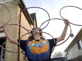 London hoop dancer River Christie-White is using his discipline to raise awareness of the needs for programs and services on reserves for children and families with special needs. (MIKE HENSEN, The London Free Press)