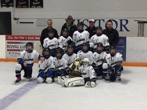 The BCH Ice Dogs Atom LL team poses proudly for a photo after their big win. (CONTRIBUTED PHOTO)