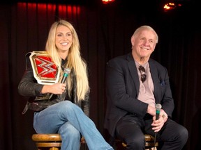 Charlotte Flair and her iconic father Ric Flair have co-authored Second Nature, which was a joint project with author Brian Shields. (WWE.com photo)