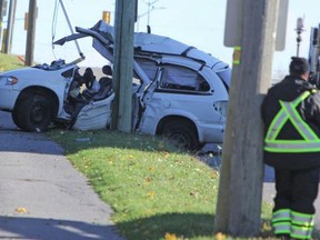 Kingston police investigating a single-vehicle collision on King Street West in Kingston, Ont. that took place on Friday November 10, 2017. Steph Crosier/Kingston Whig-Standard/Postmedia Network