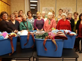 The ladies put together the four hampers (pictured) full of gifts for 50 women and children who find themselves at our local Women's Shelter and Second Stage Housing this Christmas. (Photo courtesy of Heather Ball)