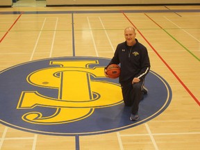 St. Joseph’s high school basketball coach Richard Mommersteeg was honoured recently when the school he’s worked at for more than 30 years dedicated the basketball court in his name. The court, now known as Mommersteeg Court, is a testament to the man’s commitment to his students and school. (Laura Broadley/Times-Journal)