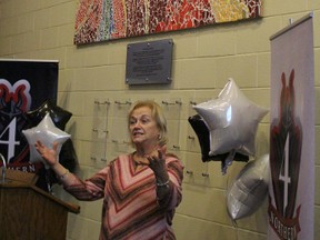 Linda Berger invites spectators to enjoy the newly-revealed mosaic at Northern Collegiate that will hopefully entice contributions to 4-Northern, an alumni group that supports the school and students. (NEIL BOWEN, Sarnia Observer)