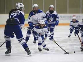 Members of the Sudbury Lady Wolves novice B team were treated to a surprise game against the Sudbury Lady Wolves midget AA team in Sudbury, Ont. on Thursday December 21, 2017. Gino Donato/Sudbury Star/Postmedia Network