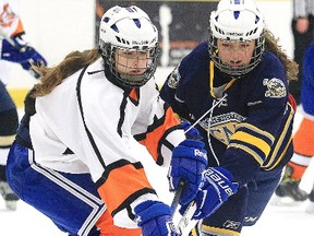 Members of the Lasalle Lancers and Notre Dame Alouettes face off at Garson Arena on Wednesday, December 20, 2017. Gino Donato/The Sudbury Star/Postmedia Network