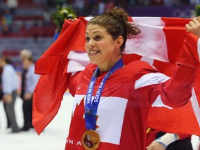 Sudbury's Rebecca Johnston celebrates gold with the Canadian women's hockey team in Sochi.(Postmedia file photo)