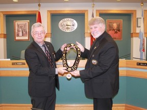 St. Clair Township CAO John Rodey (left) presents Mayor Steve Arnold with the township's new chain of office. Arnold had donated the chain to the township moments earlier as a gift marking Canada's 150th birthday.
CARL HNATYSHYN/SARNIA THIS WEEK