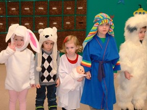 King's Kids Nursery School students dressed up as a bunny, a polar bear, Mary, Joseph and an unidentified creature to entertain a group of seniors at Rosewood Manor Retirement Community on Dec. 18. 
CARL HNATYSHYN/SARNIA THIS WEEK