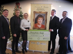 A $500,000 donation to the Maison McCulloch Hospice Foundation was announced Friday by the Perdue family in memory of Norinne E. Perdue. Left to right are: Gerry Perdue, son Cameron, daughter Angela, Gerry Lougheed Jr., chairman of the MCH Foundation board, and Leo Therrien, executive director of the hospice.