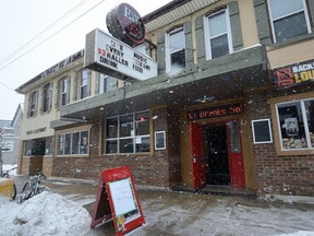 A sign inviting all into the annual turkey dinner sits in front of the Old East 765 Bar and Grill on Monday December 25, 2017. (MORRIS LAMONT, The London Free Press)