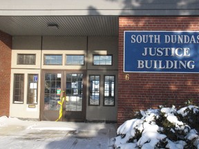 Remnants of police tape on a door at the OPP detachment in Morrisburg, at the South Dundas Justice Building. (FILE PHOTO)