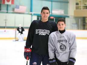 Saginaw Spirit forward and Hanmer native Damien Giroux, left, poses for a photo with his younger brother, Zacharie, during a practice at Gerry McCrory Countryside Sports Complex in Sudbury, Ont. on Thursday, December 21, 2017. Gino Donato/The Sudbury Star/Postmedia Network