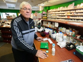 Pharmacist Gerald Chaplick fills a prescription at Turner?s Drugs in London on Wednesday. Ontario?s drug plan for youth, which takes effect Jan. 1, will cover some generic drugs for Ontarians younger than 24, he said.  (MORRIS LAMONT, The London Free Press)