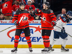 Canada's Jordan Kyrou, left, celebrates his goal with Sam Steel during a world junior game against Slovakia on Dec. 27, 2017THE CANADIAN PRESS