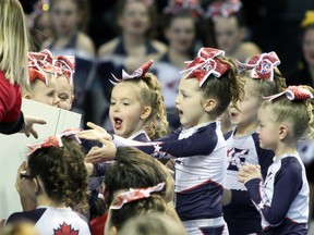 Kingston Elite's periwinkle level 1 team is awarded first place in the Tiny Prep Division at the Cheer Evolution March Madness competition at the Rogers K Rock Centre in Kingston, Ont. on Saturday March 4, 2017. Steph Crosier/Kingston Whig-Standard