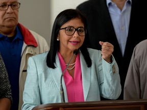 The president of Venezuela's Constituent Assembly, Delcy Rodriguez speaks during a press conference after holding a meeting with the Truth Commission, at the Foreign Ministry in Caracas on December 23, 2017. The Truth Commission recommended the release of more than 80 opponents, arrested during several protests against President Nicolas Maduro in 2014 and during this year. (AFP photo)