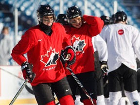 London Knights? Alex Formenton and Jake Bean take part in a practice at New Era Field in Orchard Park, N.Y., on Thursday. (Mark Blinch/THE CANADIAN PRESS)