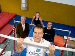 John Dubois does a pull-up in front of fellow Medway Working Group volunteers Philip Toleikis (left), Olivia Siroen, and Kevin Siroen. After pitching an outdoor ninja warrior course during the city’s recent Neighbourhood Decision Making program, the group has received $50,000 to make the unique idea a reality. (CHRIS MONTANINI, Londoner)