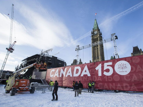 Preparations on Parliament Hill for last year's New Year's Eve events that kicked off Canada's 150th birthday celebrations. ERROL MCGIHON / POSTMEDIA
