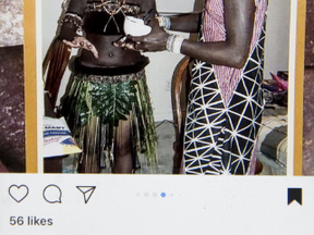 A photo posted to Instagram by friend Amanda Beardshaw shows London police Const. Katrina Aarts, right, and an unidentified woman in brown body and hair paint and what appears to be African garb.