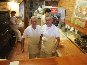 Tony Lattanzio, left, and his brother Val will be retiring soon and closing up Capri Pizza in St. Thomas. It’s one of four businesses closing in the downtown core, but the downtown development board chair Earl Taylor says it’s not indicative of a negative trend. (Laura Broadley/Times-Journal)